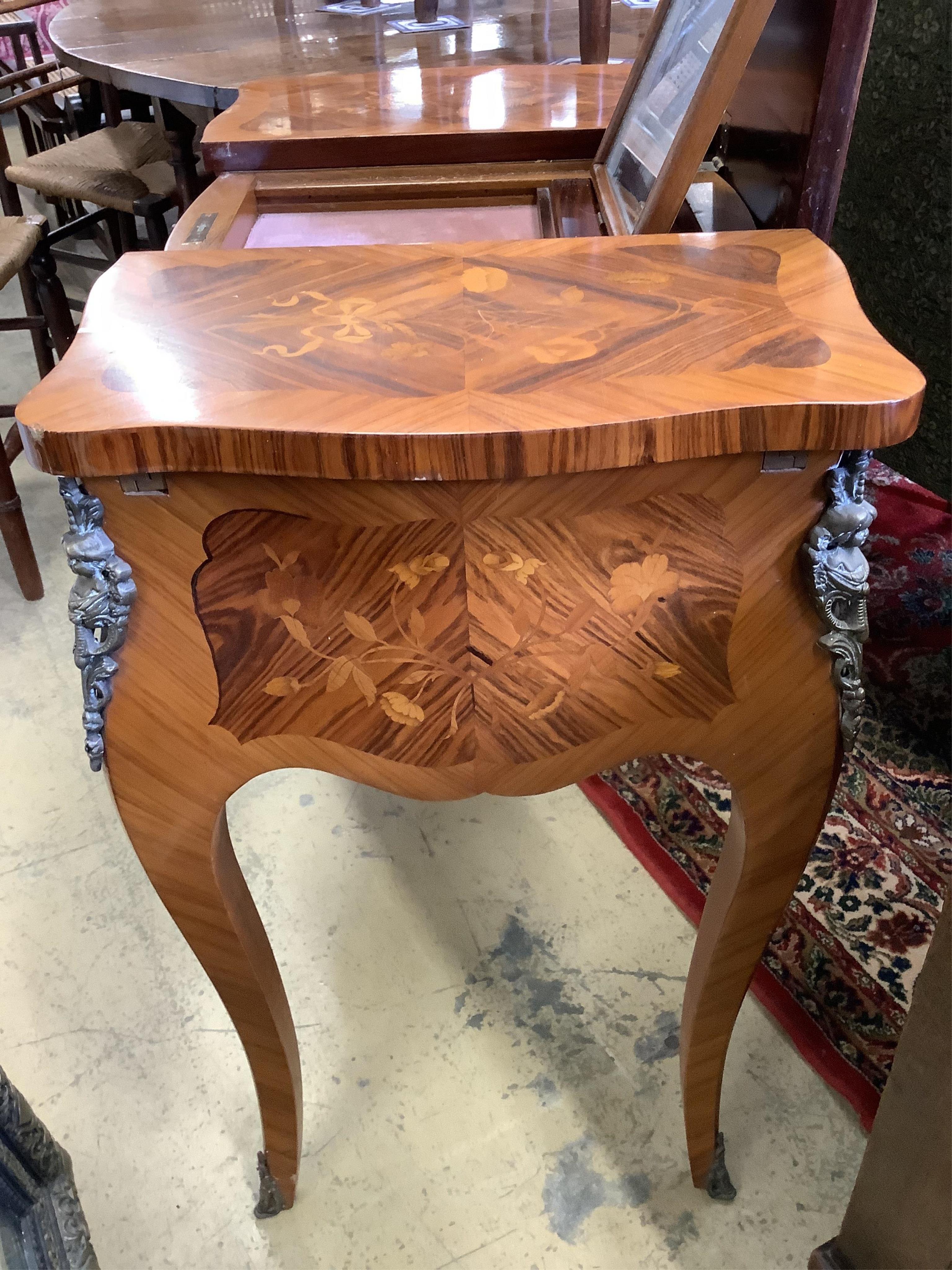 A French marquetry inlaid kingwood poudreuse, width 82cm, depth 36cm, height 74cm. Condition - good